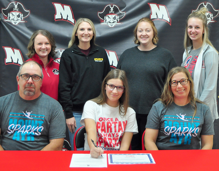Sitting (L to R): Spence Jones, Riley?s father; Riley Jones; and Rebecca Jones, Riley?s mother. Standing: Maggie Lynch, Mount Ayr High School drill team coach; Ryann Martin, owner and instructor, Ryann?s Dance Academy, Mount Ayr; Allison Pearce, Mount Ayr High School dance coach; and Paige Busch, Southwestern head dance coach.
