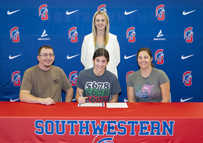 Sitting (L to R) – Steve Messler, Joslyn’s father; Joslyn Messler; and Megan Messler, Joslyn’s mother. Standing – Paige Russo, Southwestern head dance coach.