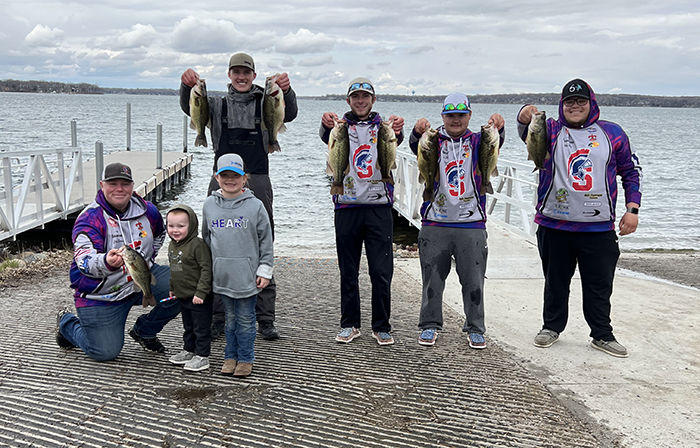 SWCC team members holding fish