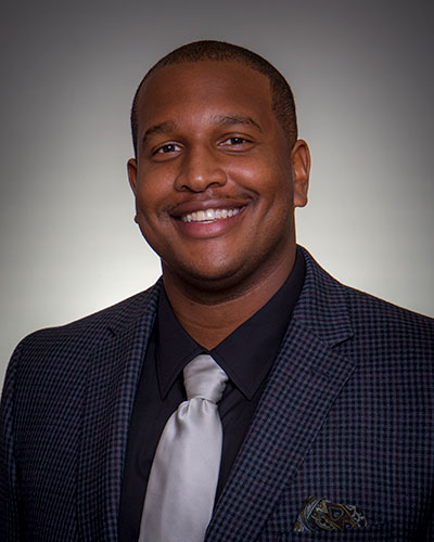 Reginald Kindle Jr., Southwestern head men's basketball coach