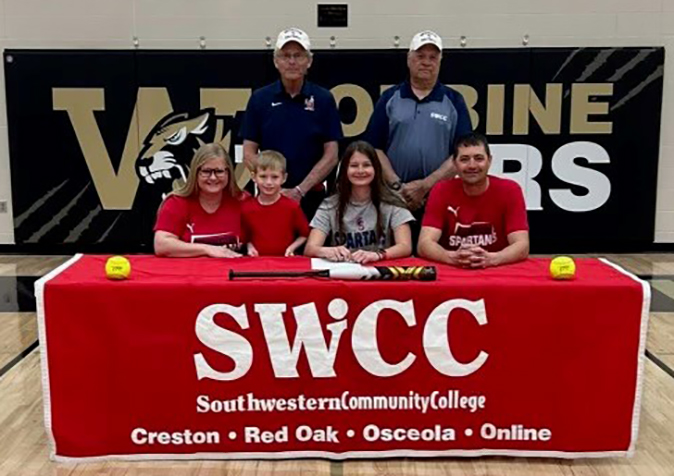 Pictured: Front row (L to R) – Kelli Gray, Jersey’s mother; Waylon Gray, Jersey’s brother; Jersey Gray; and Joe Gray, Jersey’s father. Back row (L to R) – Danny Jensen, Southwestern head softball coach, and Dan Gibbons, Southwestern assistant softball coach.