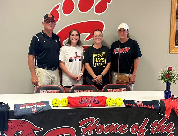 Pictured (L to R): Kenneth Cravens, Ellsworth High School head softball coach; Emma Moore; Payton Frazier, Ellsworth High School assistant softball coach; and Deb Talbott, Ellsworth High School assistant coach.