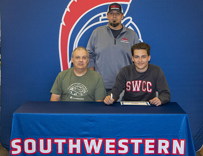 Sitting: Don and Kurtis Noonan
Standing: Josh Purdy, SWCC sports shooting coach