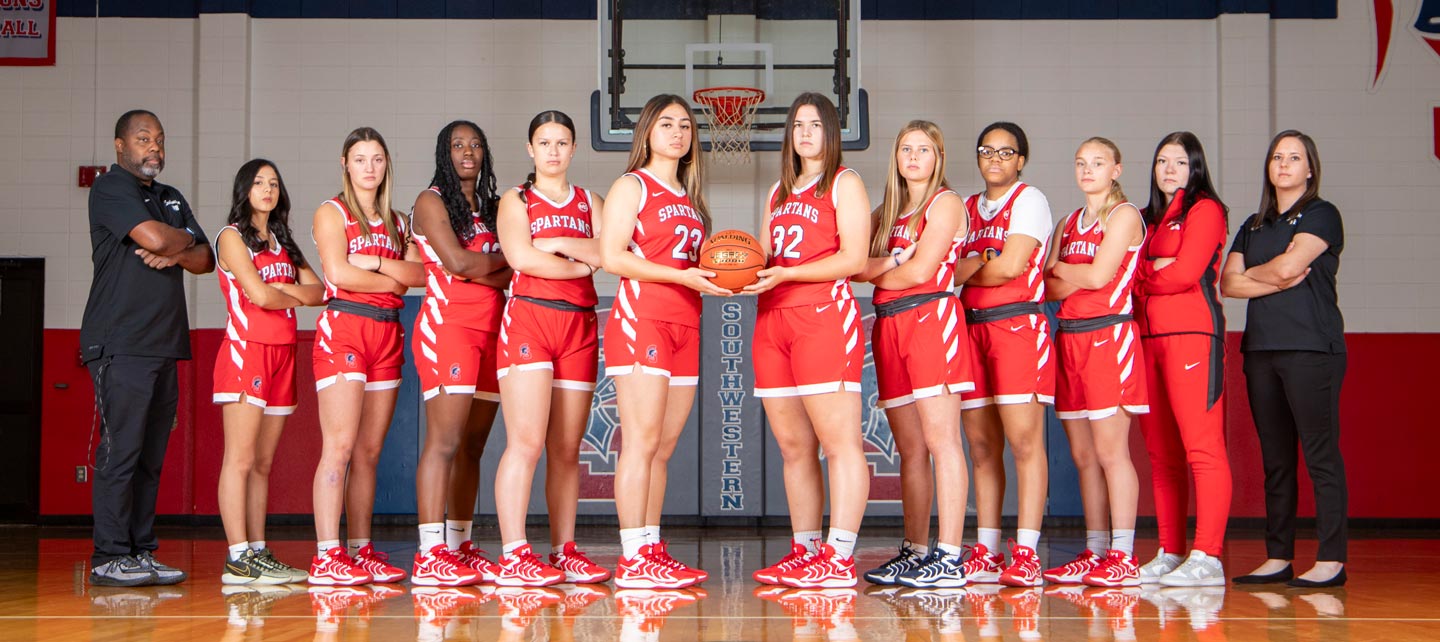 Women's Basketball team and coaches
